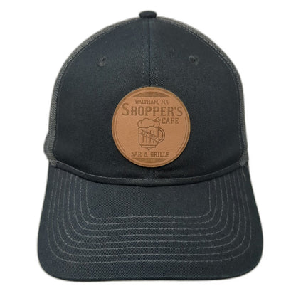 Port Authority Trucker Hat Black OSFM Shopper's Cafe Bar Grille Leather Patch