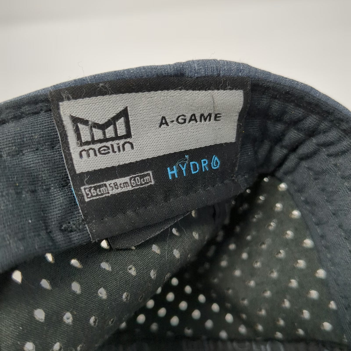 Melin A-Game Trucker Hat Gray One Size Hydro Snapback Perforated Camo Underbill