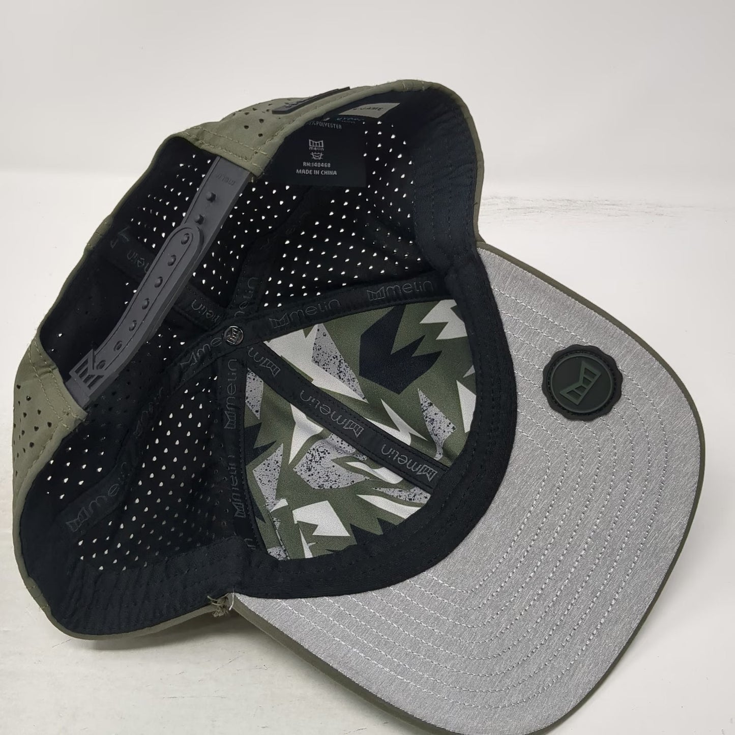 Melin Baseball Hat Green 60 CM Perforated Hydro Snapback Performance A-Game