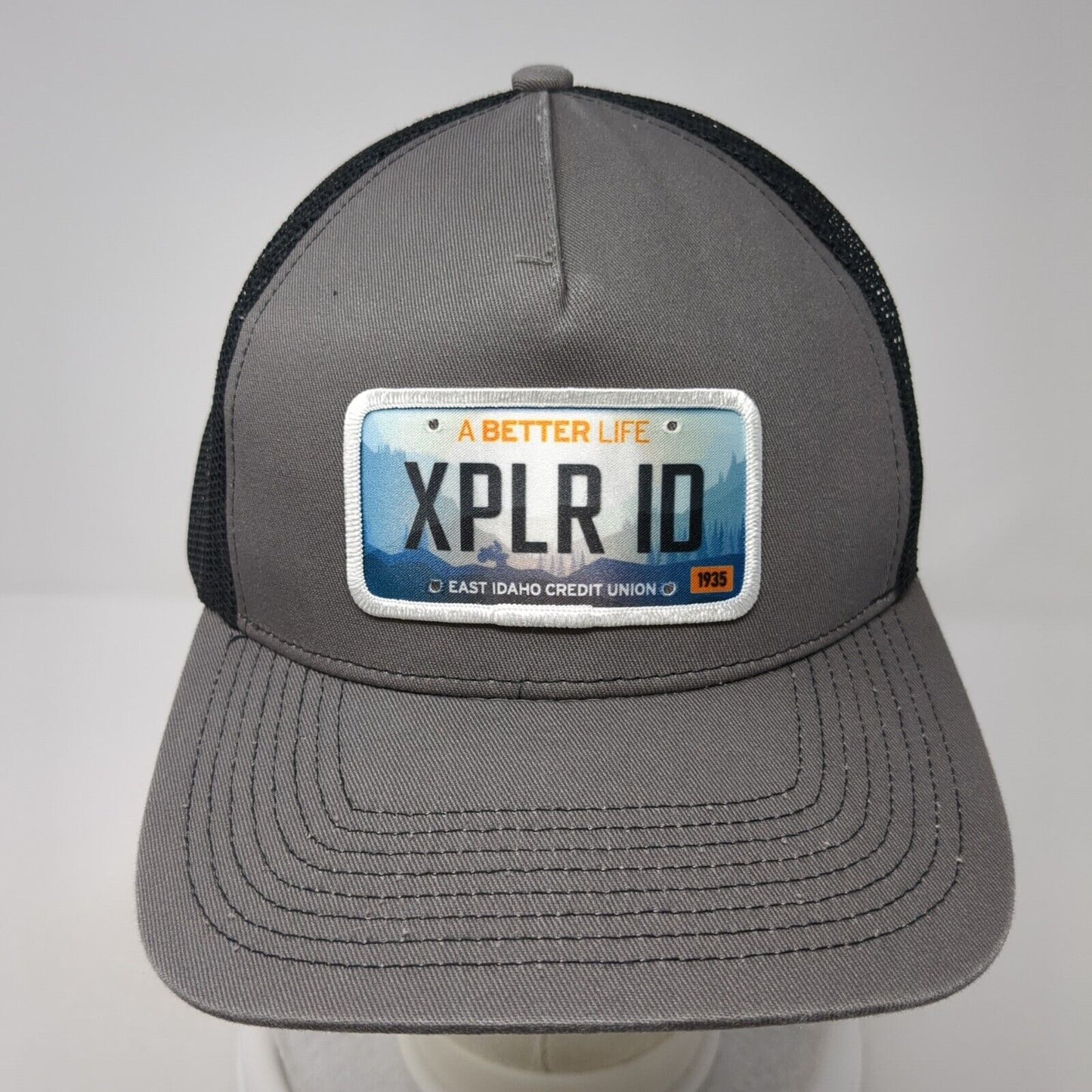 A Better Life XPLR ID East Idaho Credit Union Trucker Hat Gray OS Mesh Back OC