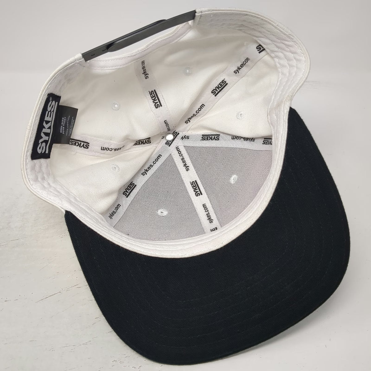 Sykes Snapback Hat White Black One Size Flat Brim Logo Patch Two Tone Cotton