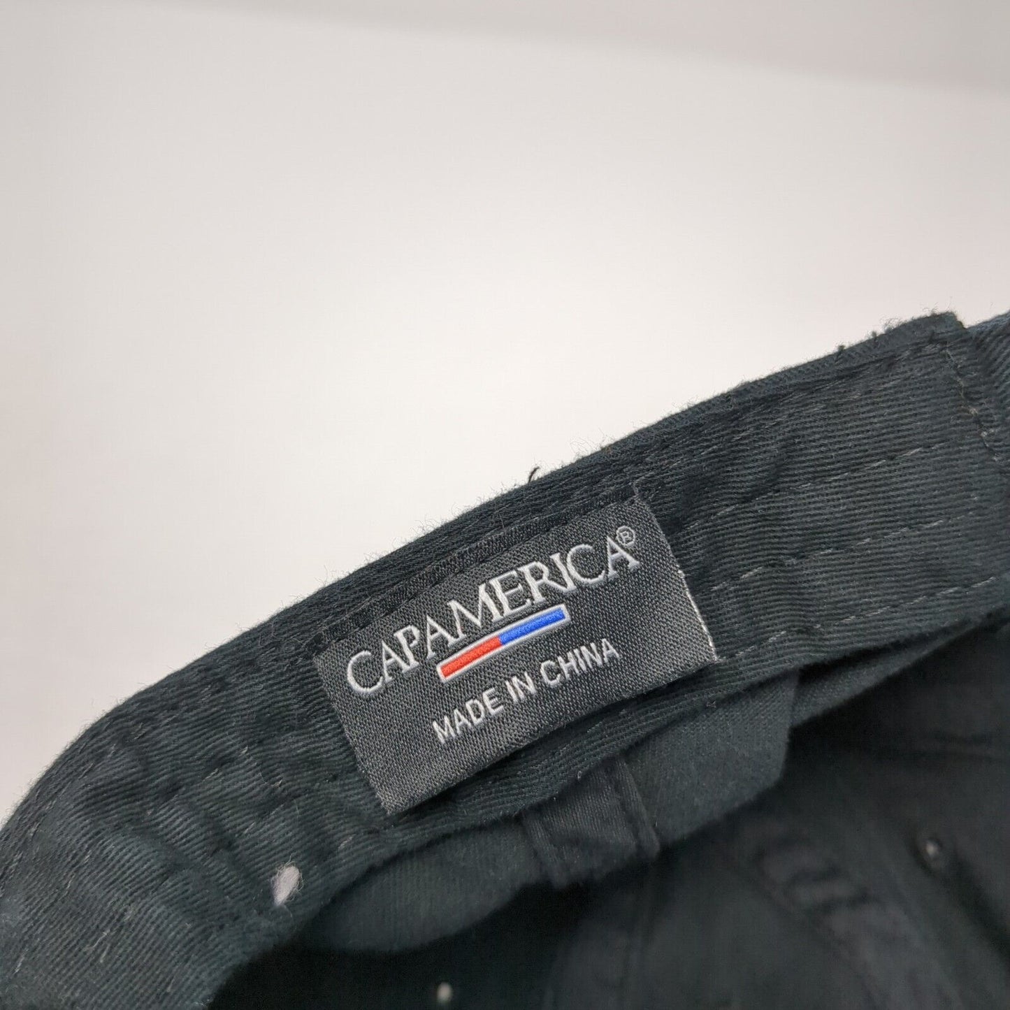 Eyecare Partners LLC Wellness Slideback Hat Black OS Adjustable Cap America