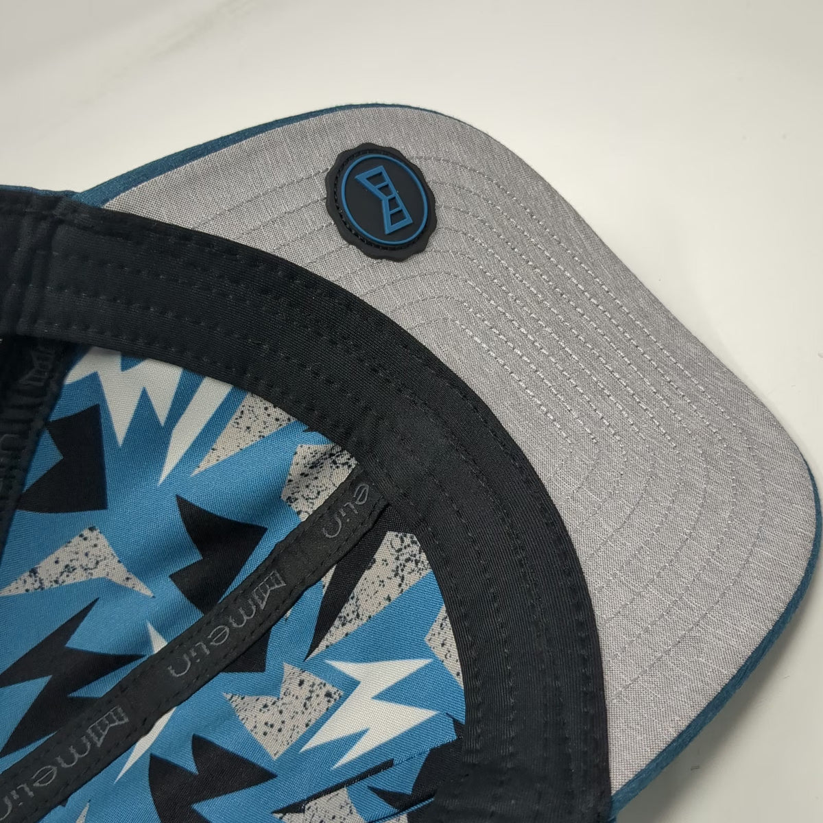 Melin A-Game Hydro Trucker Hat Blue One Size Perforated Performance Snapback