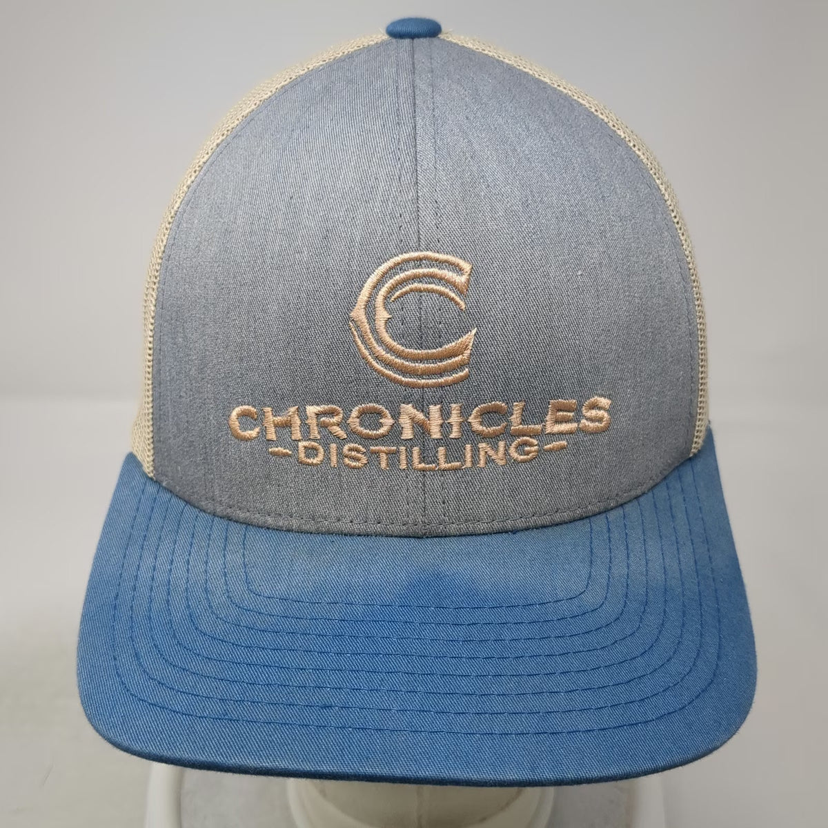 Pacific Headwear Trucker Hat Blue Beige One Size Chronicles Distilling Logo Hat
