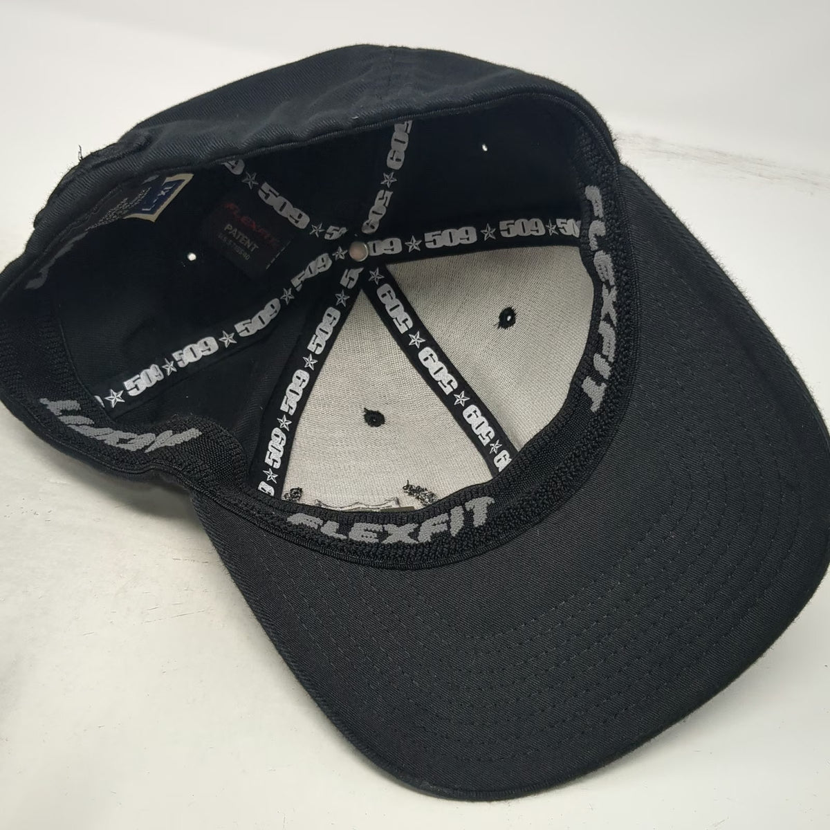 509 Baseball Cap Black XL Flexfit Metal Logo Sunburst Embroidered Stretch Hat