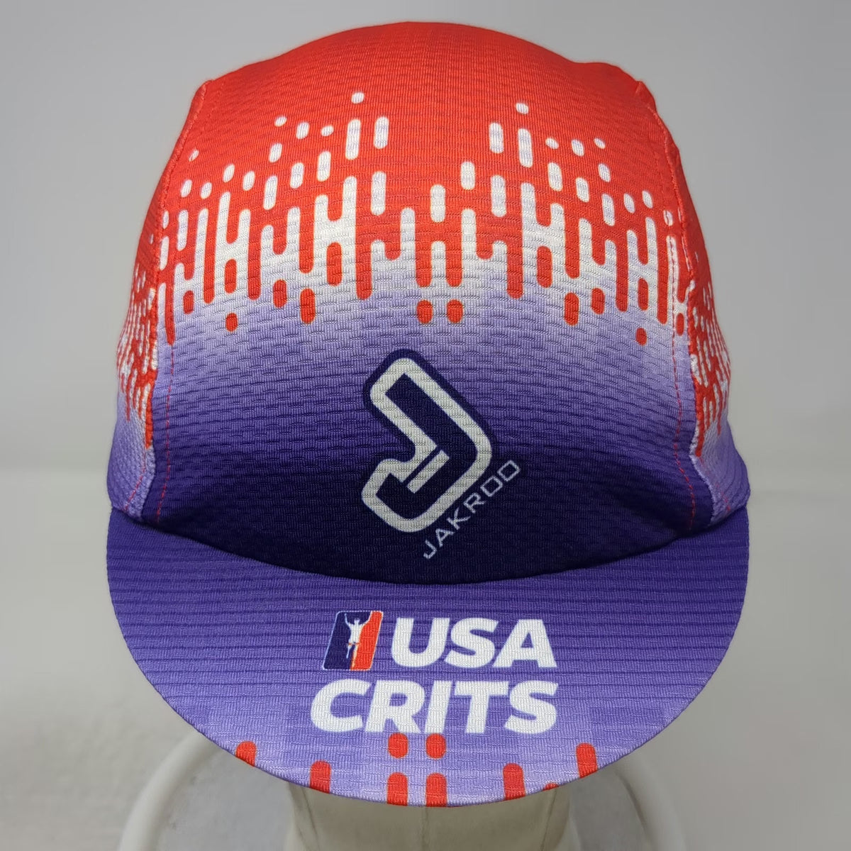 Jakroo 5 Panel Cap Purple Red L/XL USA Crits Cycling Hat Flip Up Brim Polyester