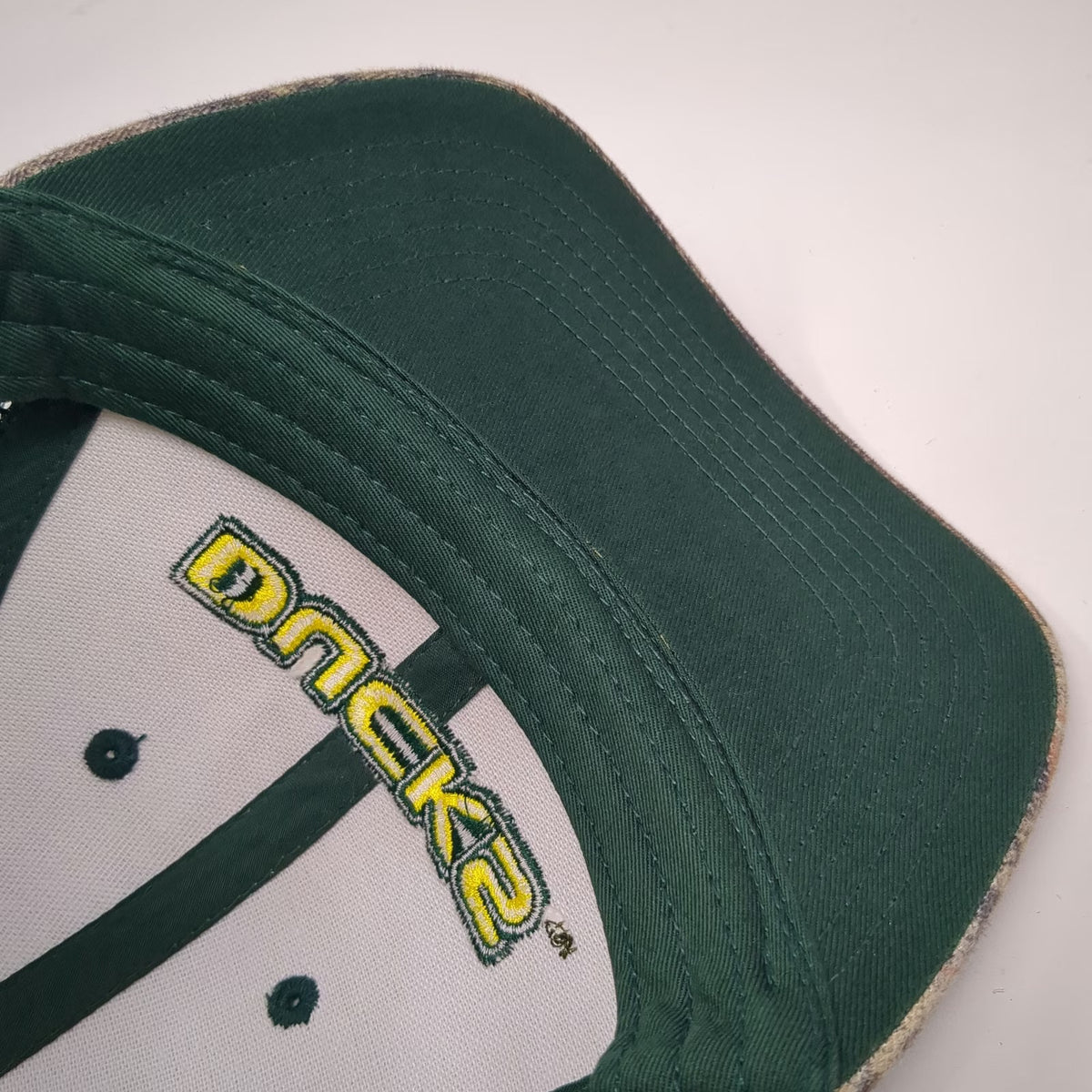 Oregon Ducks NCAA Captivating Headwear Trucker Hat Green Brown One Size Snapback