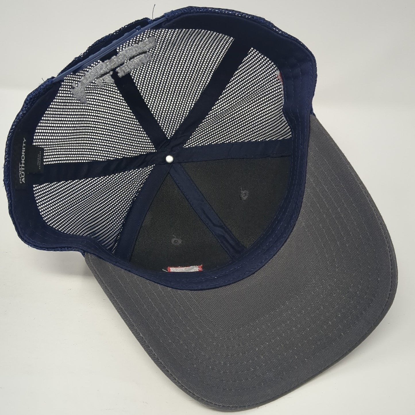J.M Thomas Forest Products Trucker Hat Multi OS Adjustable Mesh Port Authority