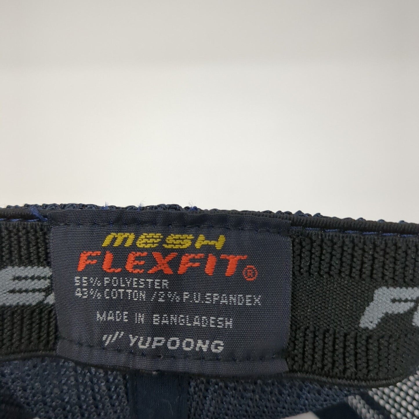 Idaho 55 Fitted Mesh Back Trucker Hat Blue One Size Flexfit Yupoong