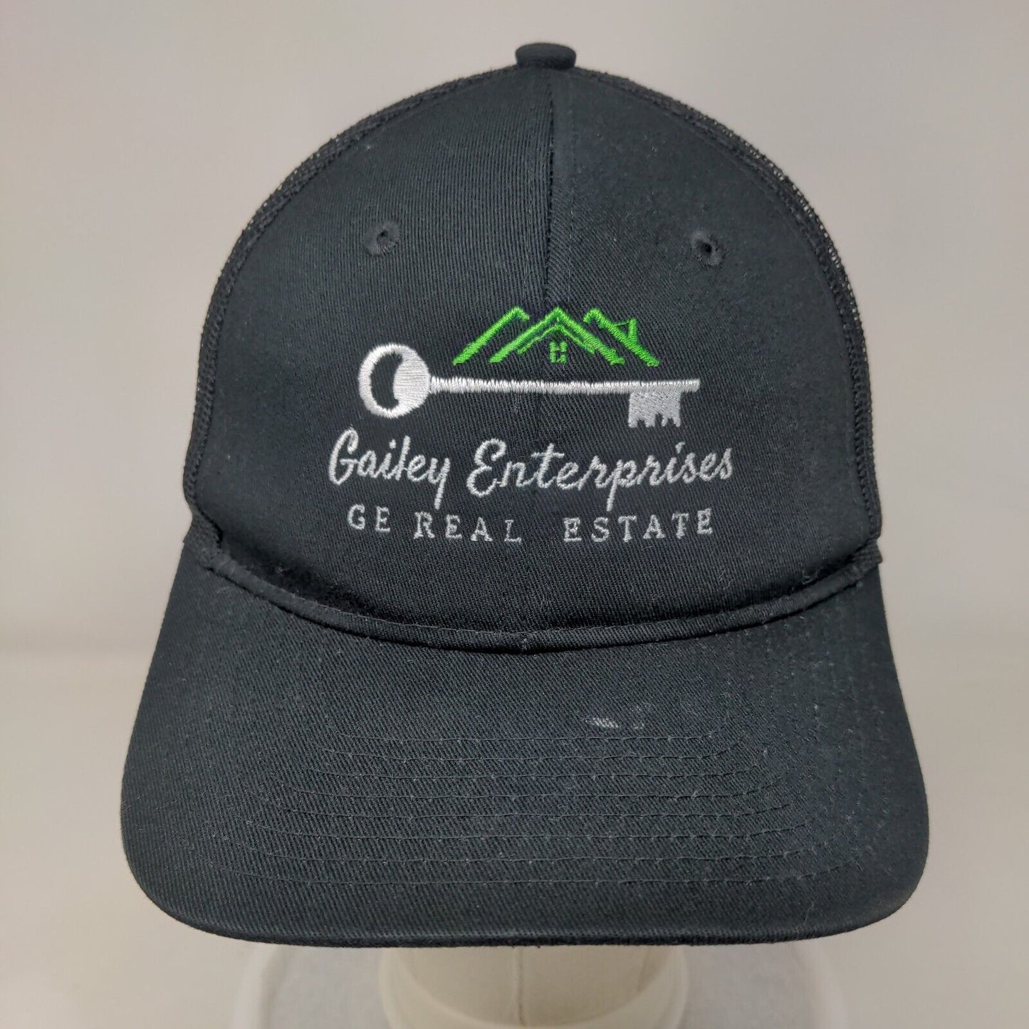 Gailey Enterprises Real Estate Snapback Trucker Hat Black One Size Mesh Back