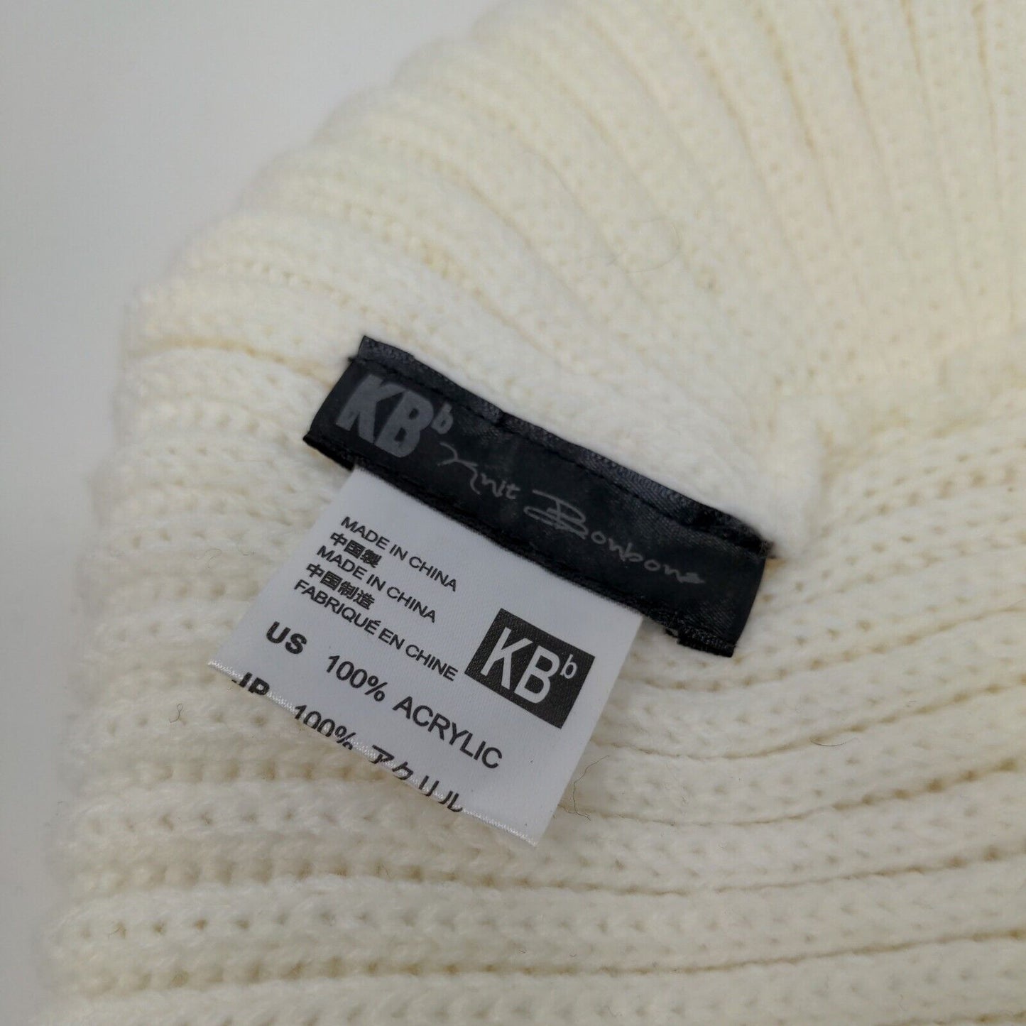 Knit Bonbons Soft Womens Hat Cream 100% Acrylic Knotted Cap Logo