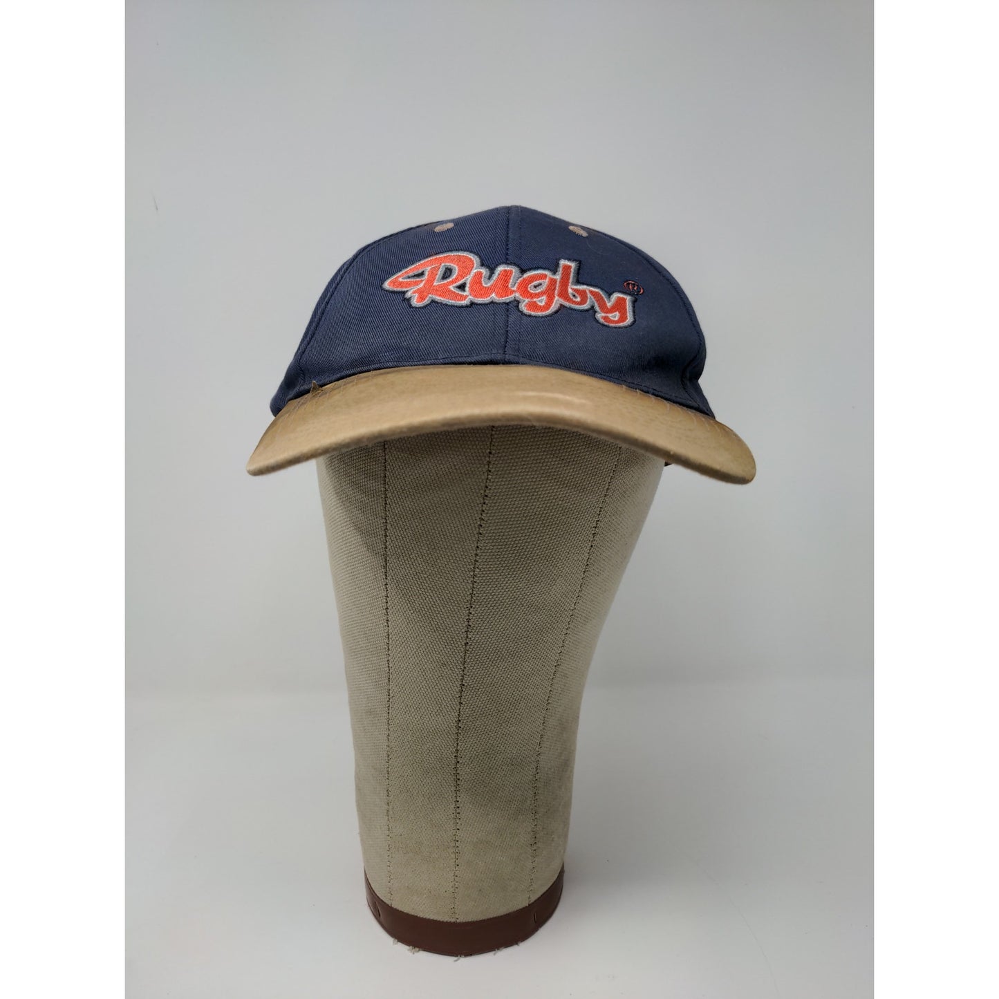 Rugby Manufacturing Company Slideback Hat Blue 7 Brown Embroidered Logo