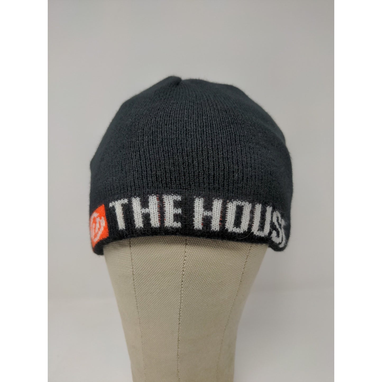 The House Striped Beanie Hat Orange & Black Spell Out Logo Knit