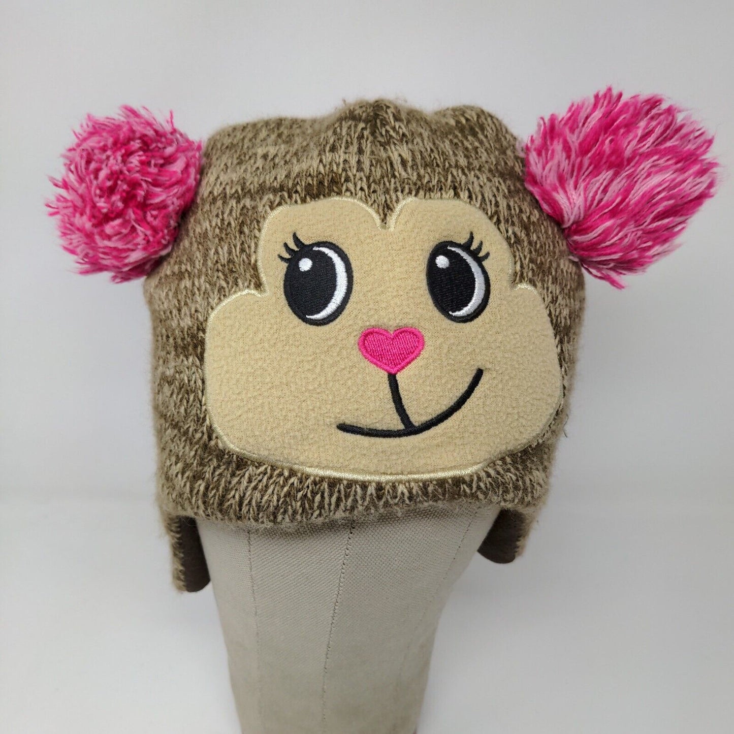 Knitted animal hat with ear flaps. Brown with pink Pom Poms.