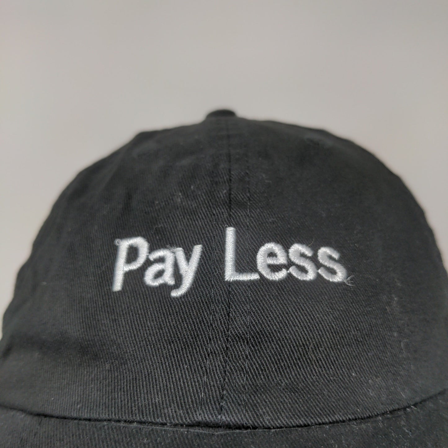 Fashion Seal Men's Pay Less Slideback Hat Embroidered Spell Out Black